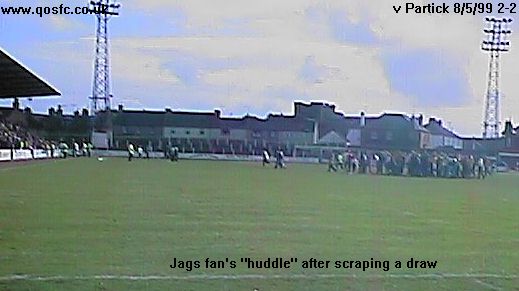 [Partick fans huddle at the end]