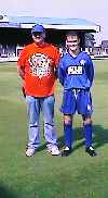 [Kevin McCormick and Denis Boyle show off the pitch]
